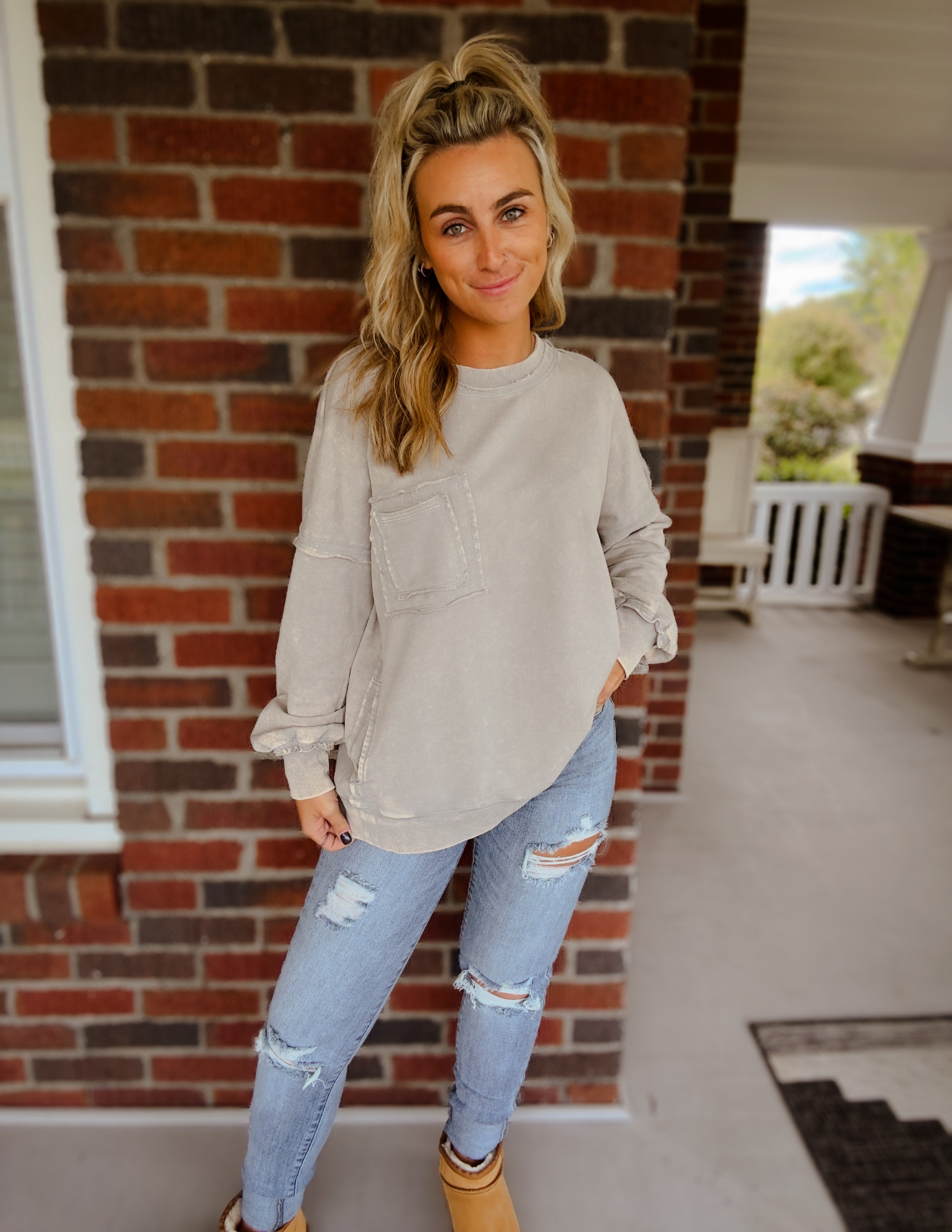 Acid wash raw edge front pocket pullover