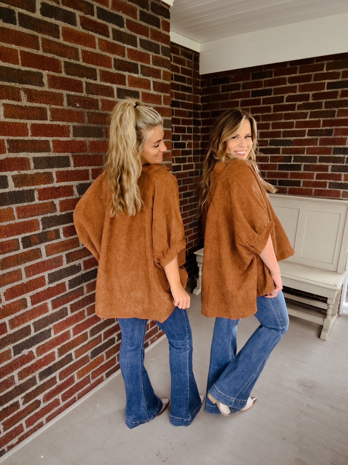 In the orange corduroy top