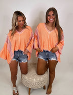 It's a vibe frayed edge top- Coral