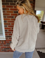 Acid wash raw edge front pocket pullover