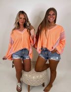 It's a vibe frayed edge top- Coral